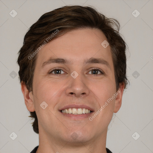 Joyful white young-adult male with short  brown hair and brown eyes