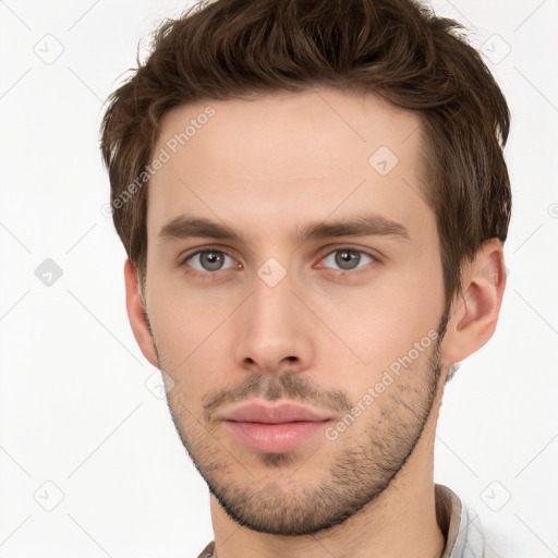 Neutral white young-adult male with short  brown hair and brown eyes