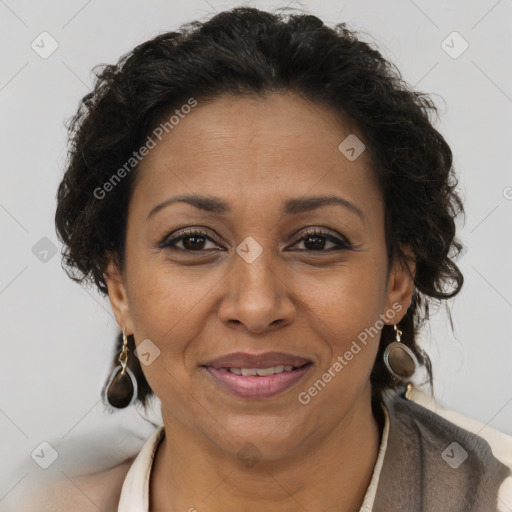 Joyful black adult female with short  brown hair and brown eyes