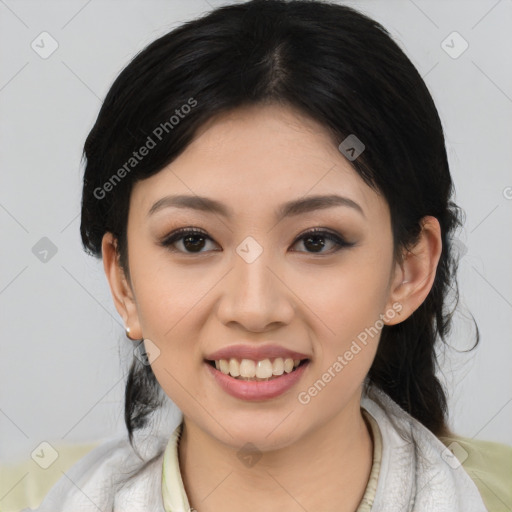 Joyful asian young-adult female with medium  black hair and brown eyes