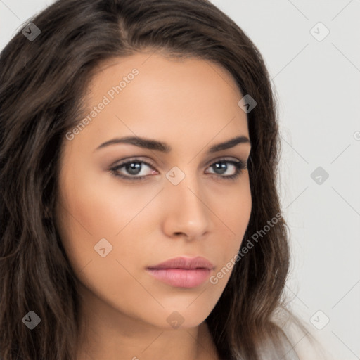 Neutral white young-adult female with long  brown hair and brown eyes