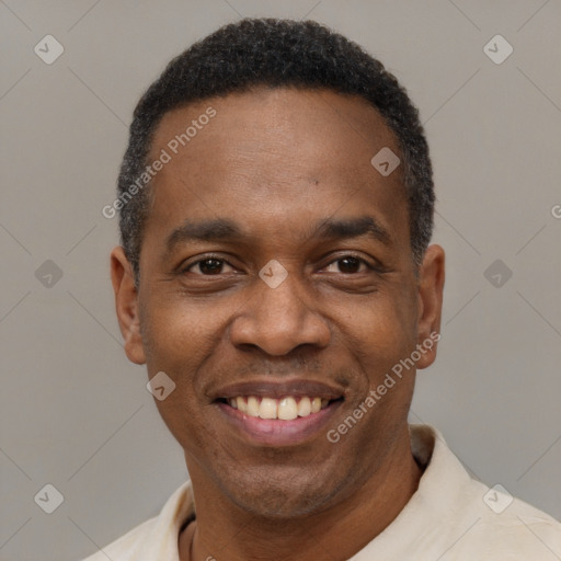 Joyful latino adult male with short  black hair and brown eyes