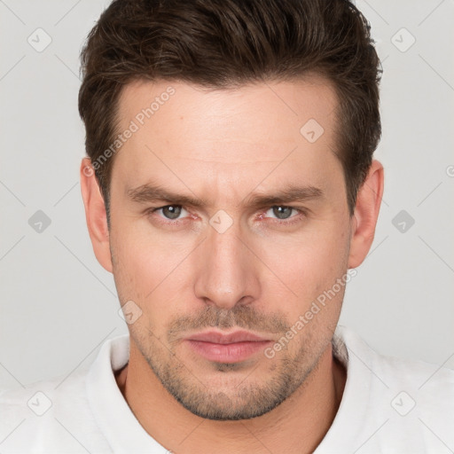 Neutral white young-adult male with short  brown hair and brown eyes