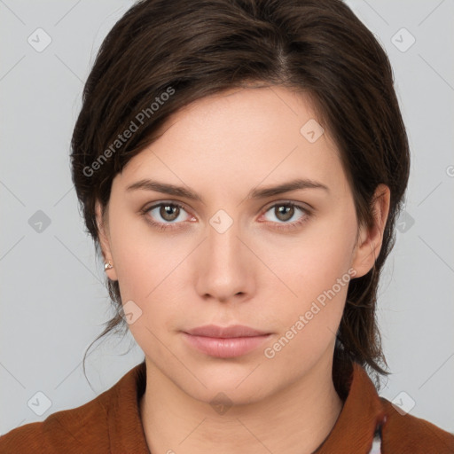 Neutral white young-adult female with medium  brown hair and brown eyes