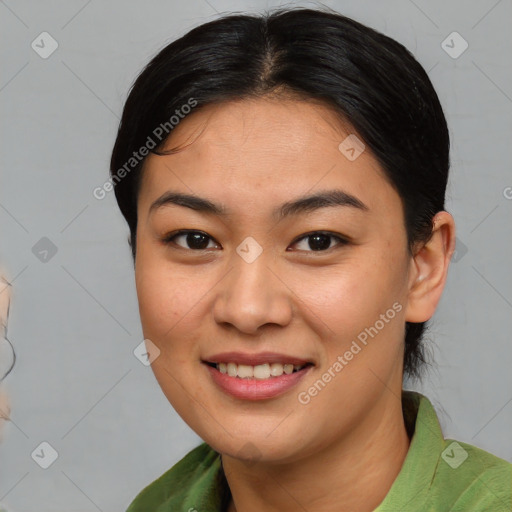 Joyful asian young-adult female with medium  brown hair and brown eyes