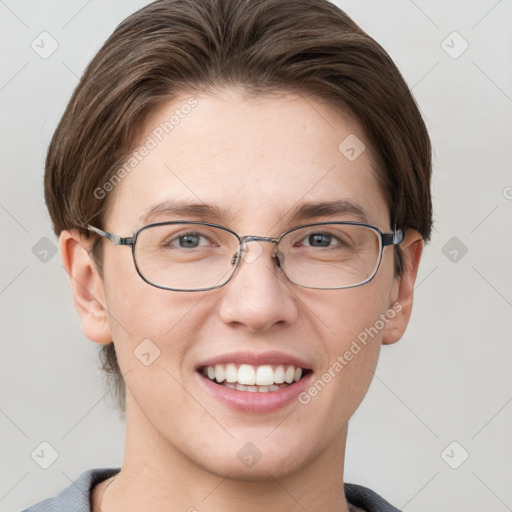 Joyful white adult female with short  brown hair and grey eyes