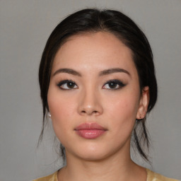 Neutral asian young-adult female with medium  black hair and brown eyes