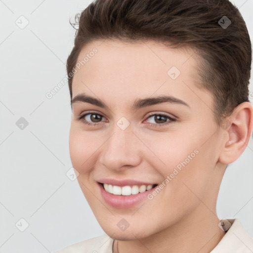 Joyful white young-adult female with short  brown hair and brown eyes