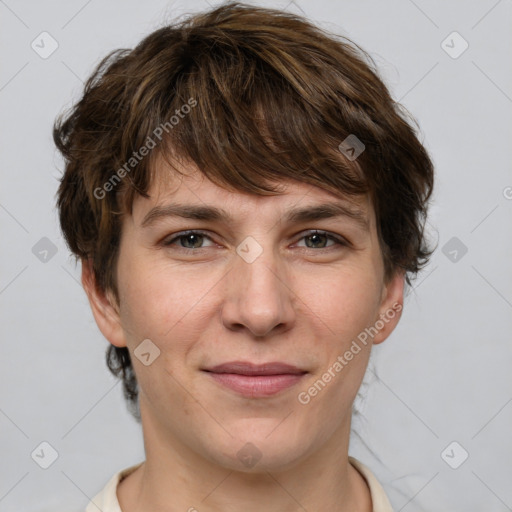 Joyful white young-adult female with short  brown hair and grey eyes