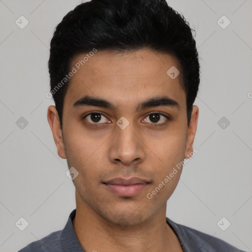 Neutral latino young-adult male with short  black hair and brown eyes