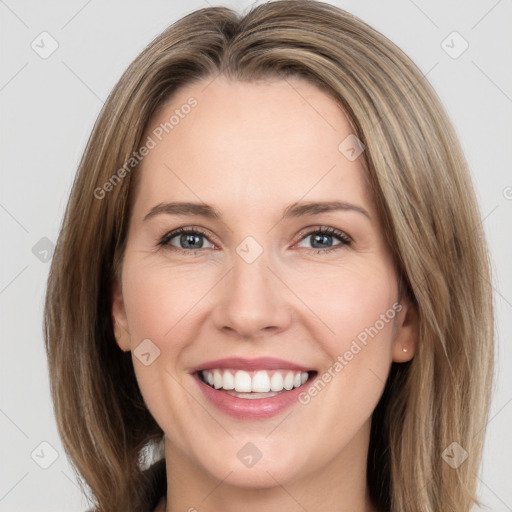 Joyful white young-adult female with medium  brown hair and green eyes