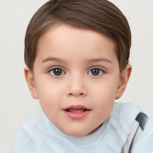 Joyful white child female with short  brown hair and brown eyes