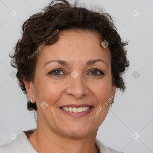 Joyful white adult female with short  brown hair and brown eyes