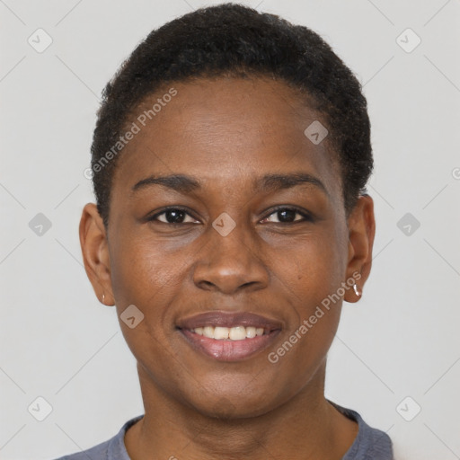 Joyful black young-adult female with short  brown hair and brown eyes