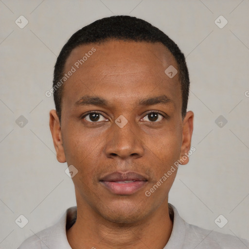 Neutral black young-adult male with short  black hair and brown eyes