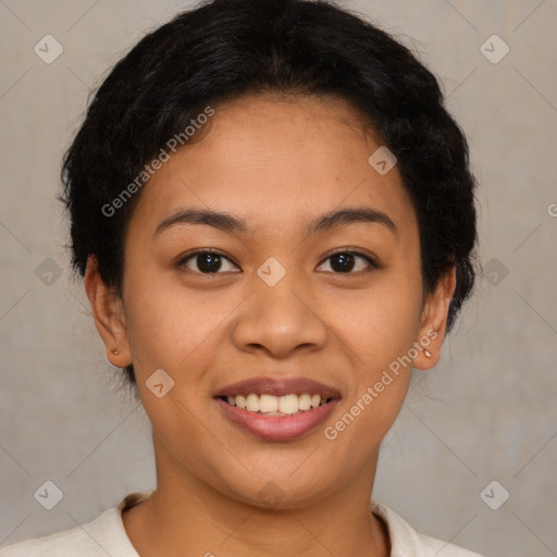 Joyful latino young-adult female with short  brown hair and brown eyes