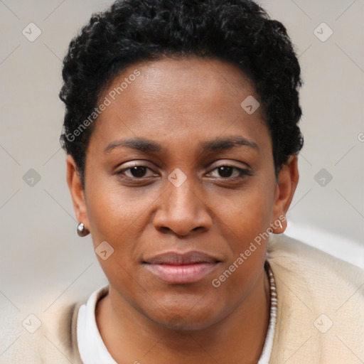 Joyful black young-adult female with short  brown hair and brown eyes