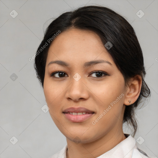 Joyful asian young-adult female with medium  black hair and brown eyes