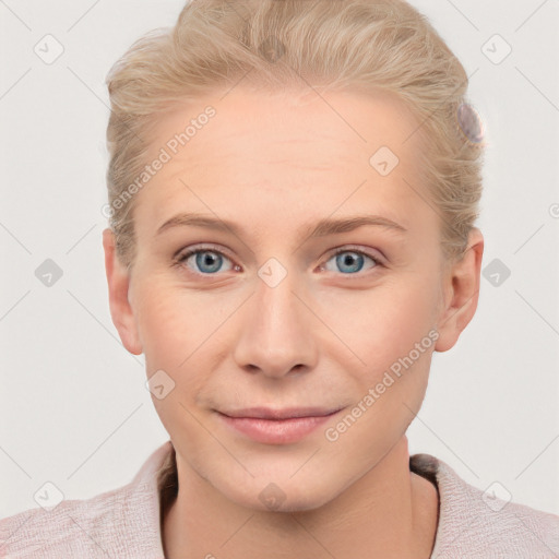 Joyful white young-adult female with short  brown hair and blue eyes