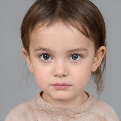 Neutral white child female with medium  brown hair and brown eyes