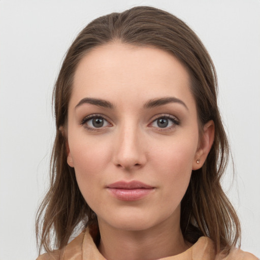 Neutral white young-adult female with long  brown hair and grey eyes