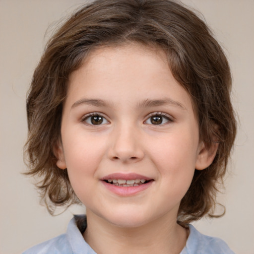 Joyful white child female with medium  brown hair and brown eyes