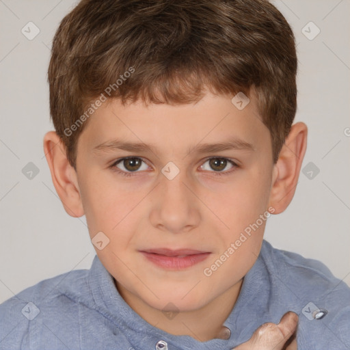 Joyful white child male with short  brown hair and brown eyes