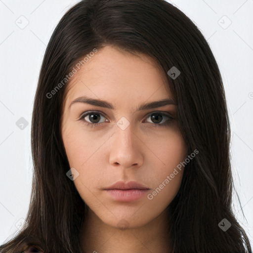 Neutral white young-adult female with long  brown hair and brown eyes