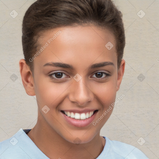 Joyful white child female with short  brown hair and brown eyes