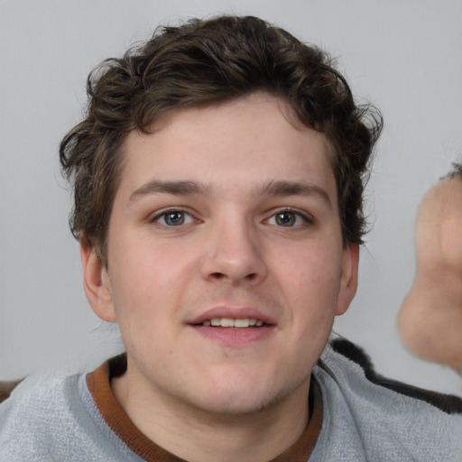 Neutral white young-adult male with short  brown hair and grey eyes