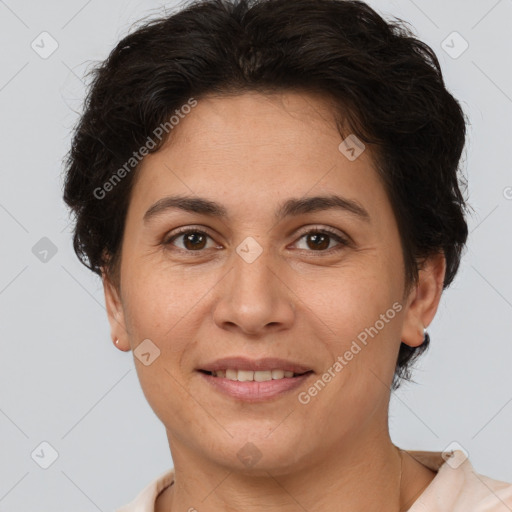 Joyful white adult female with short  brown hair and brown eyes