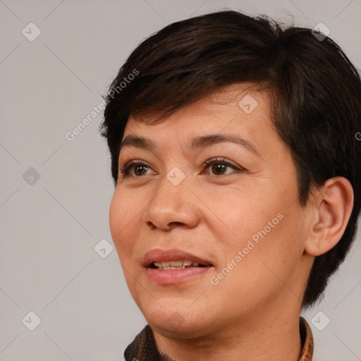 Joyful white adult female with short  brown hair and brown eyes