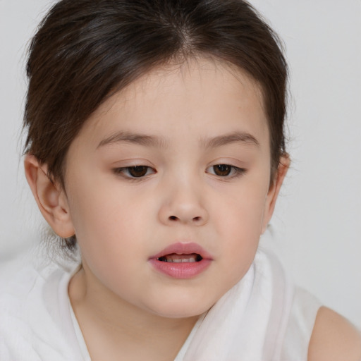 Neutral white child female with short  brown hair and brown eyes