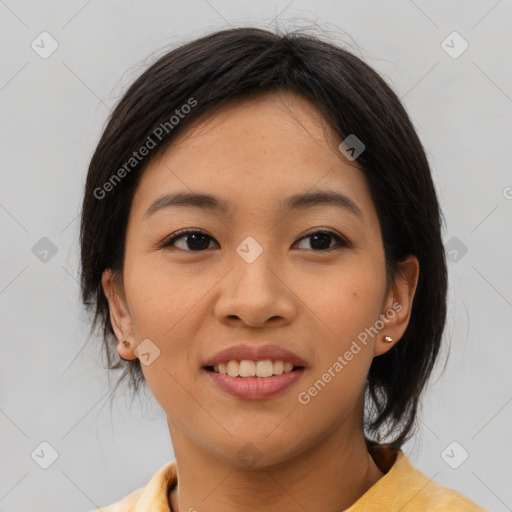 Joyful asian young-adult female with medium  brown hair and brown eyes