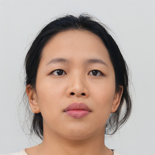 Neutral asian young-adult female with medium  black hair and brown eyes
