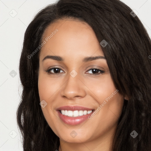 Joyful white young-adult female with long  black hair and brown eyes