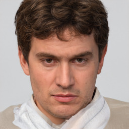 Neutral white adult male with short  brown hair and brown eyes