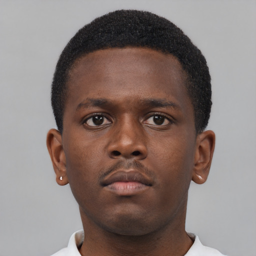 Neutral black young-adult male with short  brown hair and brown eyes