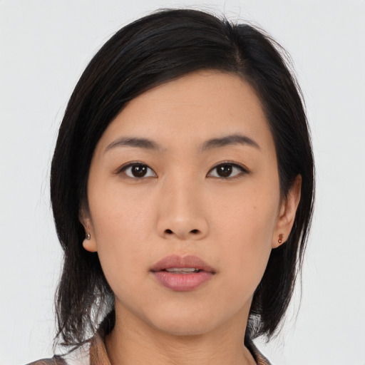 Neutral asian young-adult female with medium  black hair and brown eyes