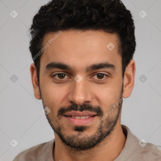 Joyful white young-adult male with short  black hair and brown eyes