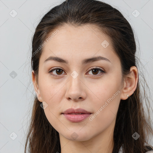 Joyful white young-adult female with long  brown hair and brown eyes