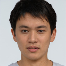 Neutral asian young-adult male with short  brown hair and brown eyes