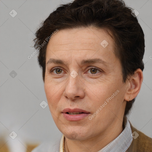 Joyful white adult female with short  brown hair and brown eyes