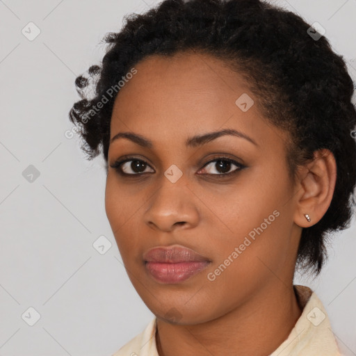 Neutral black young-adult female with medium  black hair and brown eyes