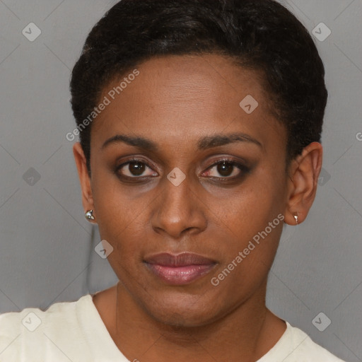 Joyful black young-adult female with short  brown hair and brown eyes
