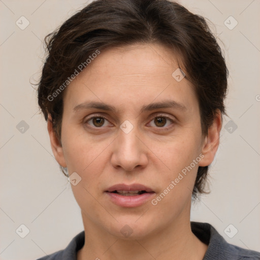 Joyful white adult female with short  brown hair and brown eyes