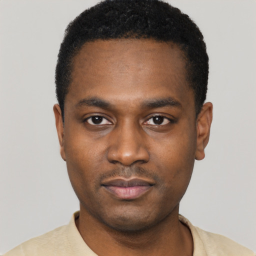 Neutral black young-adult male with short  black hair and brown eyes