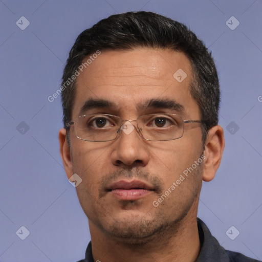 Neutral white adult male with short  black hair and brown eyes
