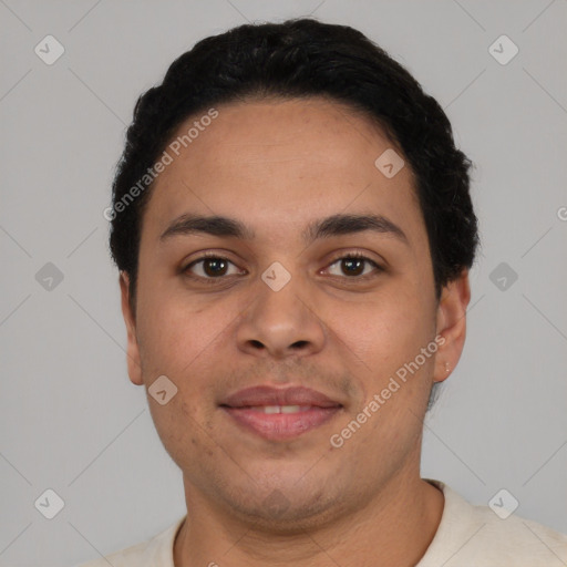 Joyful latino young-adult male with short  black hair and brown eyes