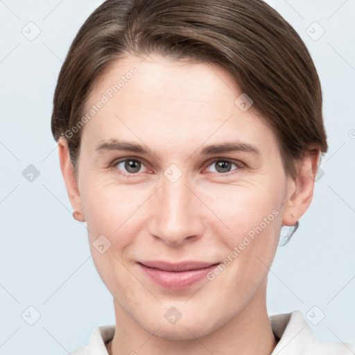 Joyful white young-adult female with short  brown hair and brown eyes